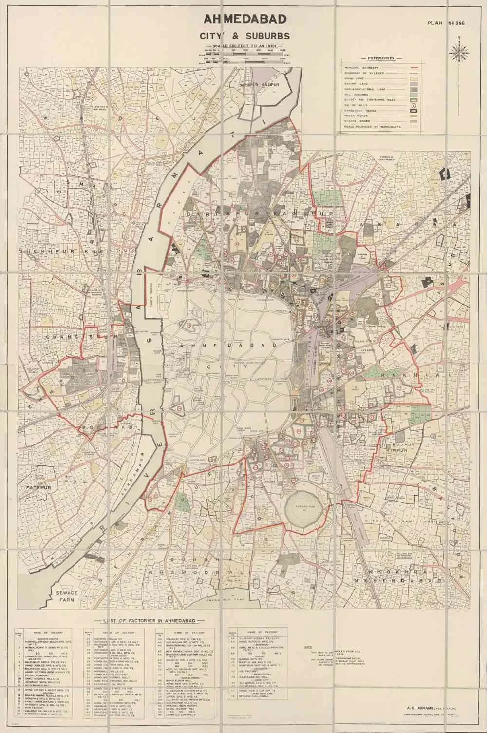 A 1917 survey plan of Ahmedabad city and suburbs, the Sabarmati curving through it, the municipal boundary drawn in red and the mills marked across the wards.